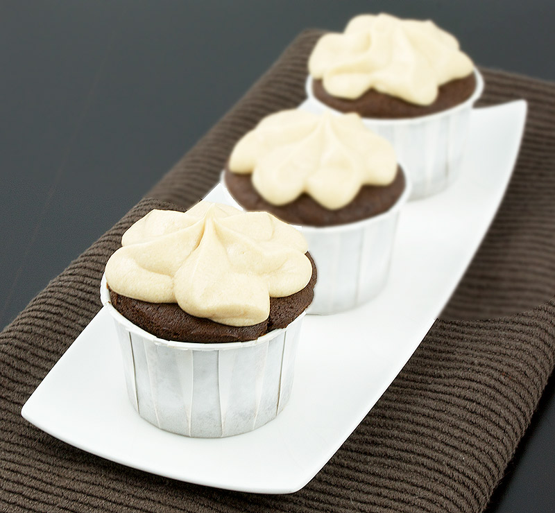 chocolate cupcake recipes, Magnolia Bakery's chocolate cupcakes recipe, easy chocolate desserts A photo of 3 Caramilk® Cream-Vodka Cooler Cupcakes with Caramel Buttercream Icing.