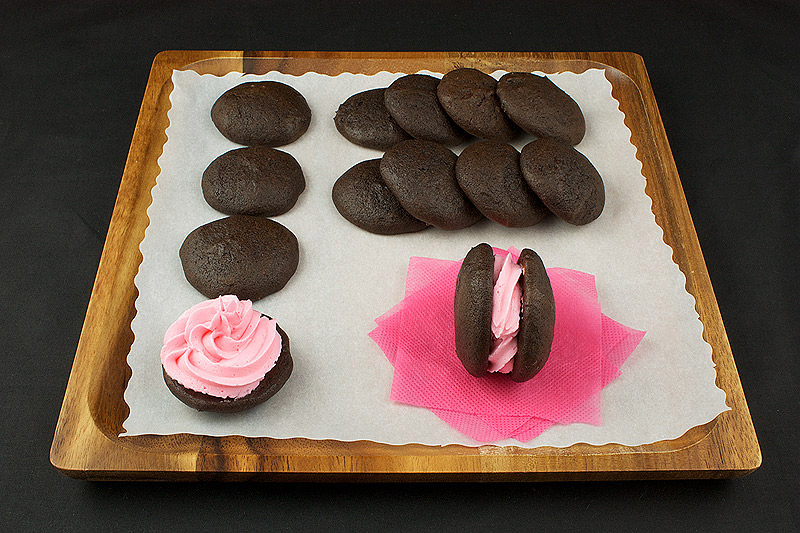 chocolate whoopie pies, whoopie pie recipe, whoopie pie recipes A photo of a tray of Chocolate Whoopie Pies with Vanilla Swiss Meringue Buttercream filling.