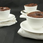 Chocolate-Hazelnut Self-Saucing Puddings A photo of 3 Chocolate-Hazelnut Self-Saucing Pudding desserts served in white bowls.