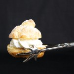 Profiteroles with Vanilla Crème Chantilly A photo of a Profiterole with Vanilla Crème Chantilly.