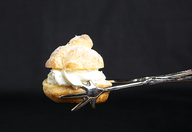 Profiteroles with Vanilla Crème Chantilly A photo of a Profiterole with Vanilla Crème Chantilly.