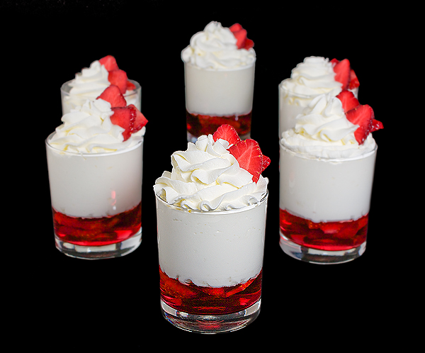 Strawberry Shortcake Trifle A photo of several Strawberry Shortcake Trifle desserts.
