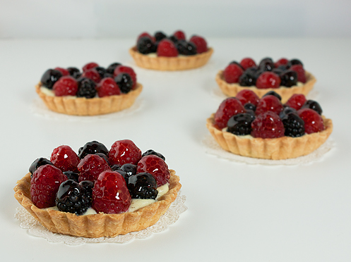 Mini Desserts- Fruit Tarts A photo of mini desserts, fruit tarts.