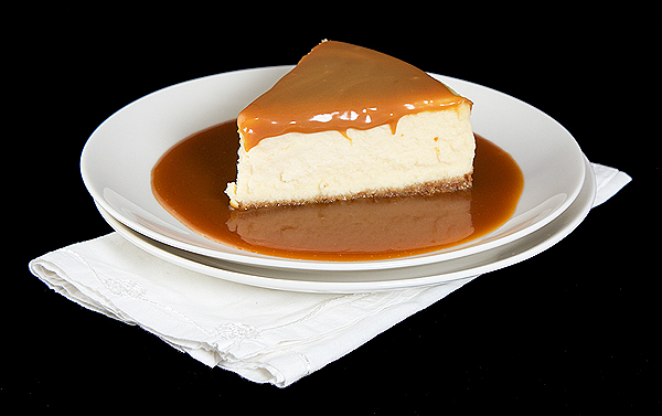 Mascarpone Cheesecake A photo of a Mascarpone Cheesecake with Amaretto, Almond Crust and Amaretto-Caramel Sauce.