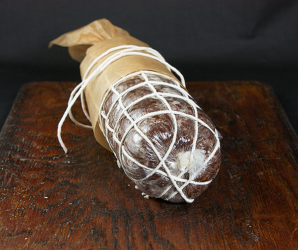Chocolate Treats A photo of a delicious chocolate treat, Chocolate Salami - wrapped in parchment and secured with string to resemble a savoury salami.
