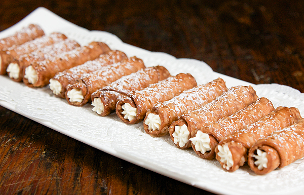 Mini Cannoli A photo of mini cannoli used as a topping for Cannoli Cupcakes.
