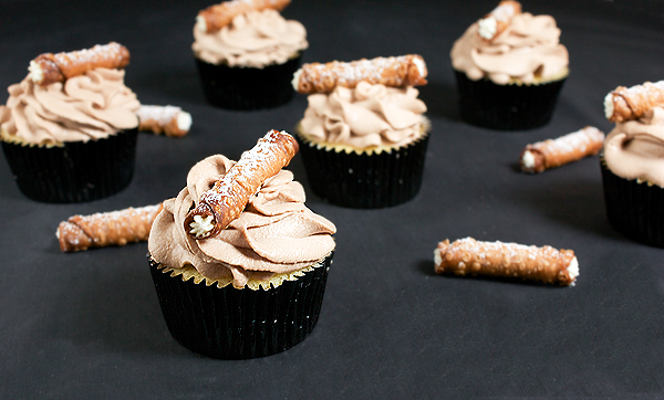 Gourmet Cupcakes A photo of Gourmet Cupcakes with mini cannoli.