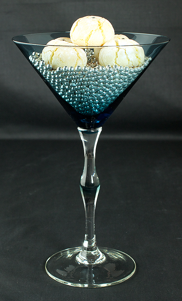 Italian cookie recipes, holiday cookies, cookies Italian A photo of Italian cookies, Amaretti displayed on a bed of silver dragees in a martini glass.