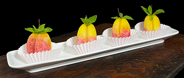 Italian Cookies A photo of Italian Cookies, Pesche Dolci displayed on a white dish.