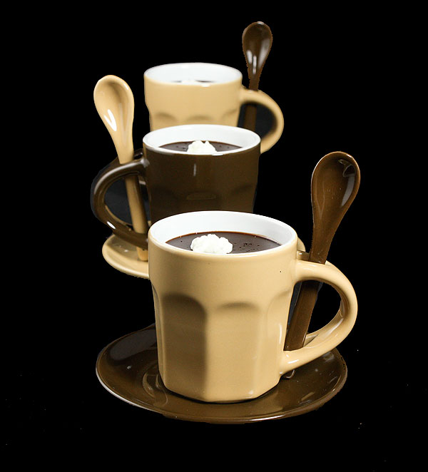 pot de cream An image of a French dessert, pot de cream served in espresso cups and displayed in a row, one behind the other.