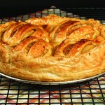 Grace's Sweet Life Sfoglia di Mele con Crema Pasticcera A photo of an Italian Rustic Tart, Sfoglia di Mele (Apple Tart), cooling on a wire rack.