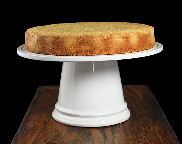 Grace's Sweet Life Almond Cake A photo of an Italian Almond Cake on a white cake stand.