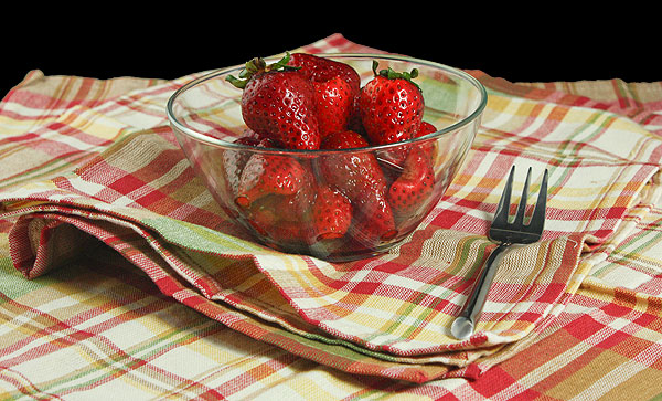 Grace's Sweet Life Balsamic Strawberries A photo of a bowl full of Balsamic Strawberries.