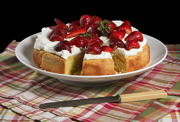 Grace's Sweet Life Italian Cake A photo of Italian Cornmeal Cake with Mascarpone Cream Topping and fresh strawberries.