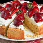 Grace's Sweet Life Polenta Cake A photo of Polenta Cake decorated with whipped Mascarpone Cream and Balsamic and Brown Sugar Strawberries.