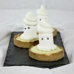A photo of three Ghost Tarts on rectangular-shaped slate board.