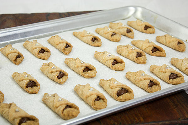 Photo taken looking down on a tray of Italian Cookies with Nutella filling.